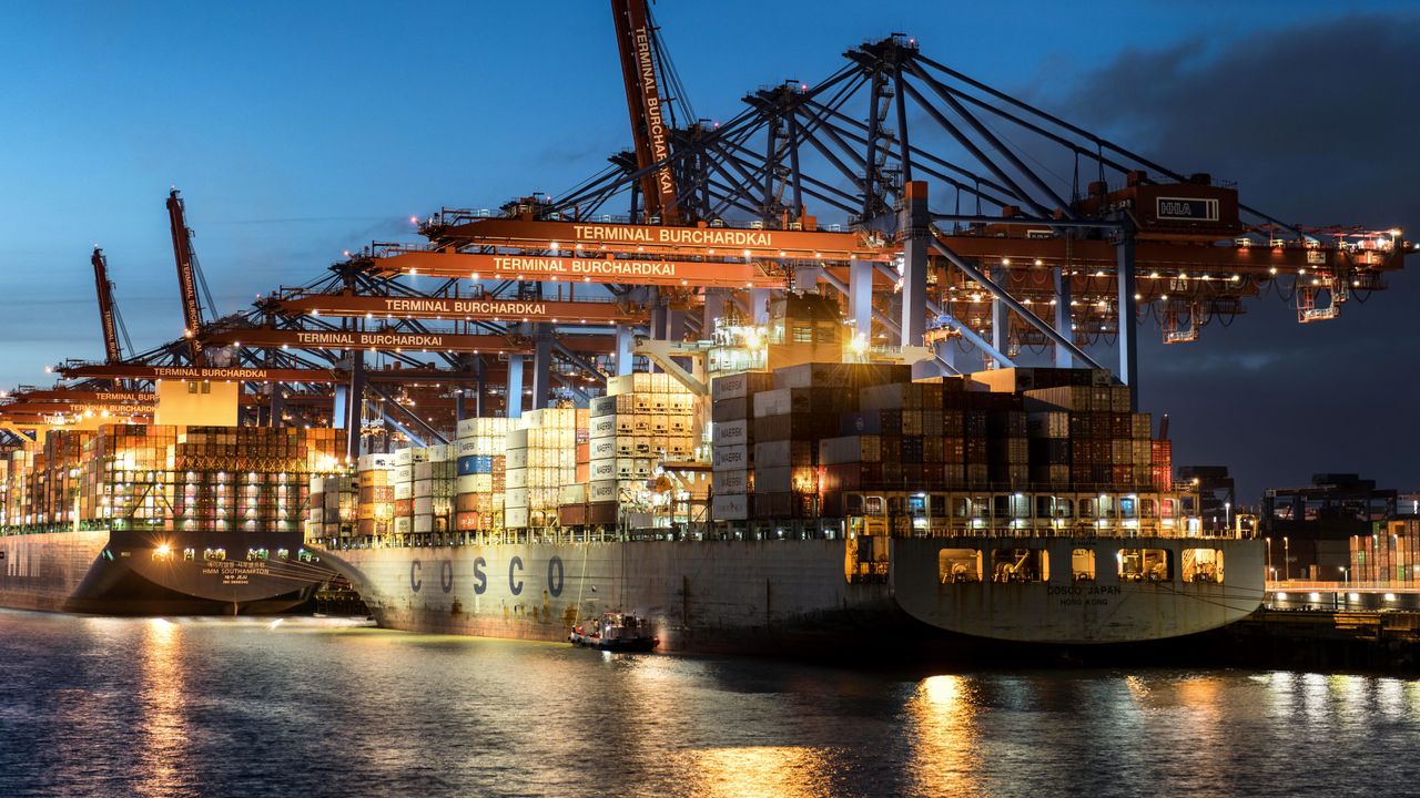 Mastering the First Impression: Your intriguing post title goes here Vibrant evening view of cargo operations at Terminal Burchardkai, Hamburg.